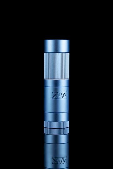blue ZAM pocket grinder on a black background