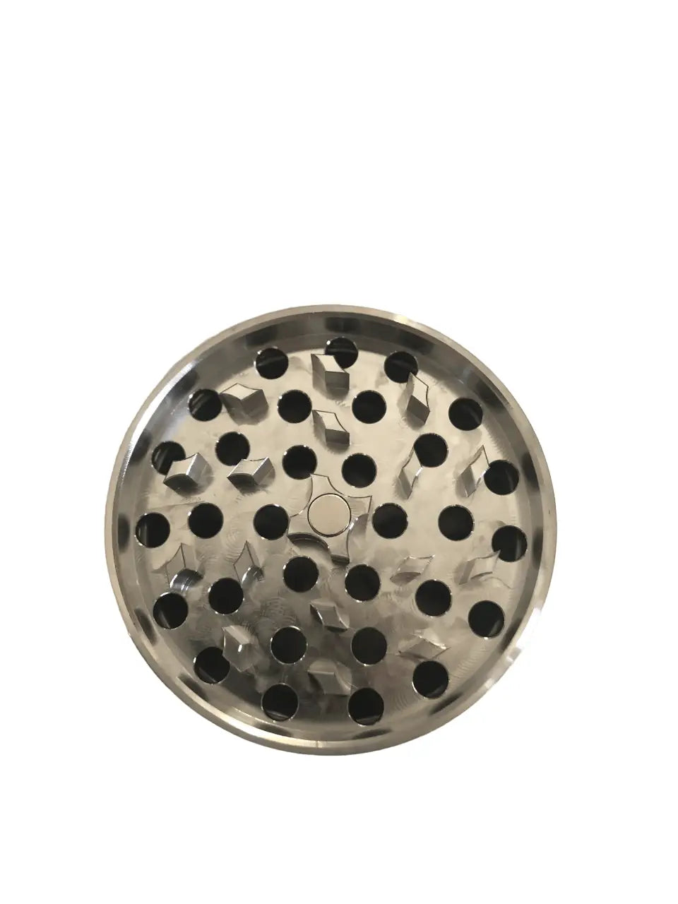 Main grinding chamber with easy view of magnet, teeth, and holes.