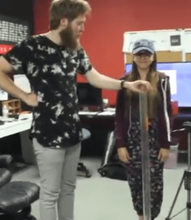 silencedhippie standing next to 4 foot bong