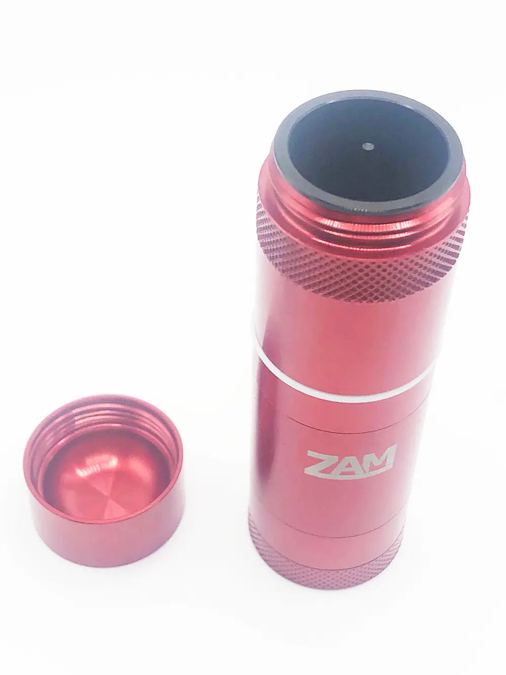 red zam pocket grinder with black metal de-bowler insert